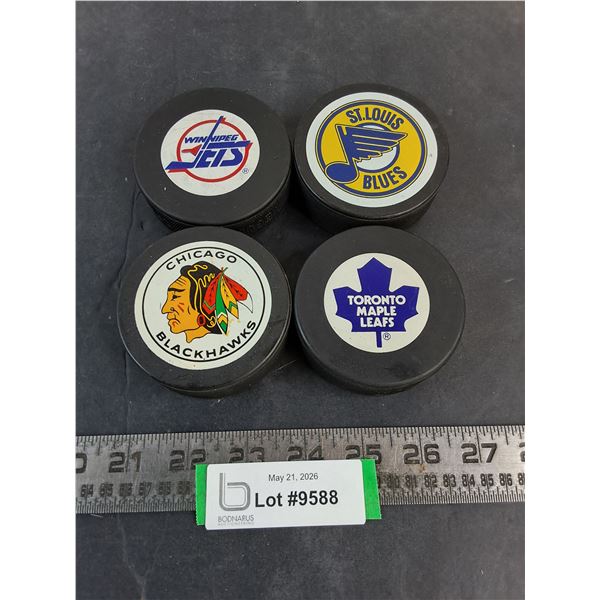 (4) NHL Team Logo Pucks
