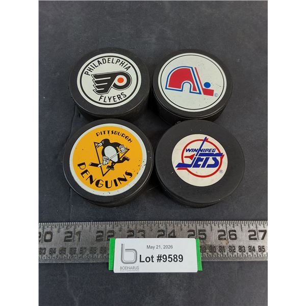 (4) NHL Team Logo Pucks