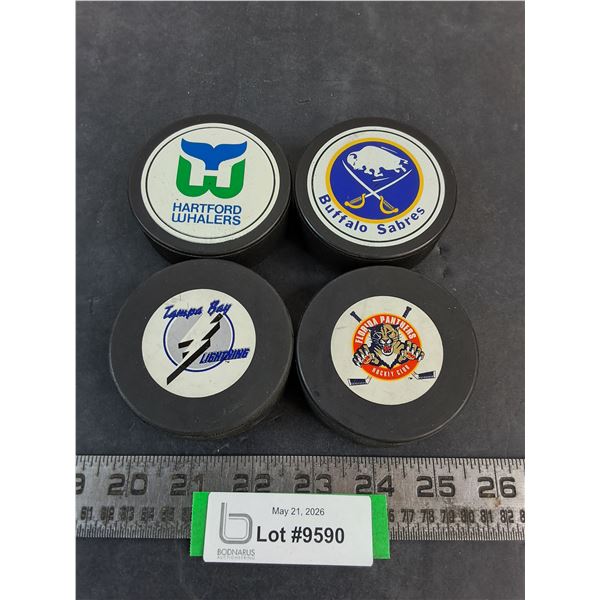 (4) NHL Team Logo Pucks