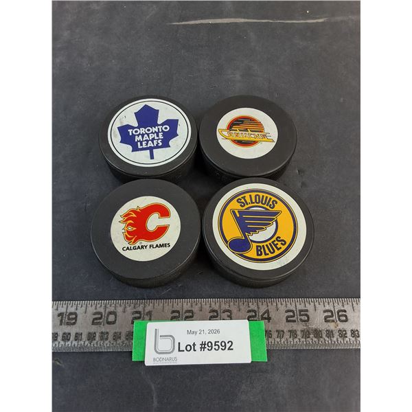 (4) NHL Team Logo Pucks