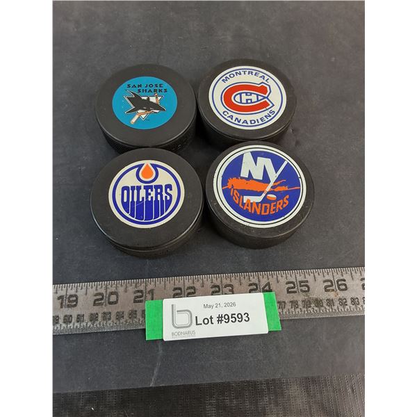 (4) NHL Team Logo Pucks