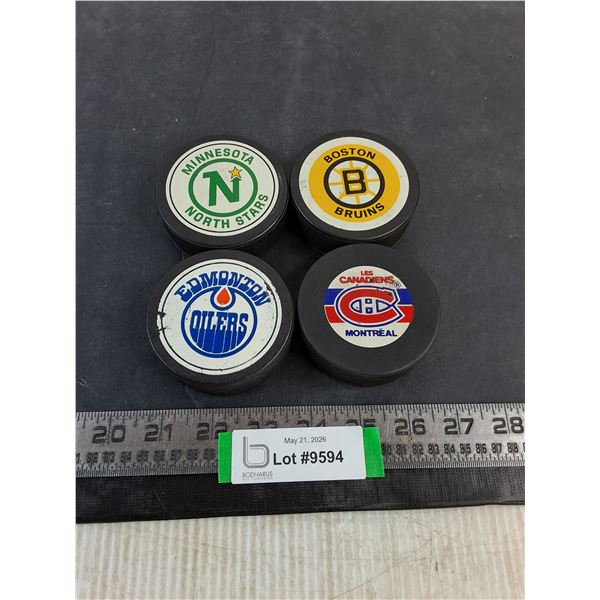 (4) NHL Team Logo Pucks