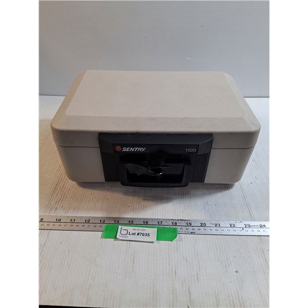 Sentry Safe #1100 w/ key. 14x10x6.5"
