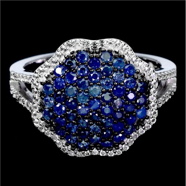 ROUND DIAMOND CUT BLUE SAPPHIRE AND WHITE TOPAZ RING IN 14K WHITE GOLD OVER 925 STERLING SILVER - SI