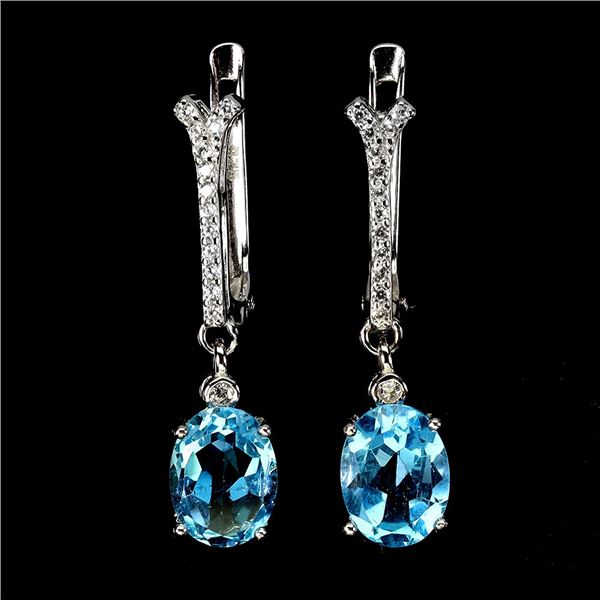 8X6 OVAL CUT SWISS BLUE TOPAZ EARRINGS IN 14K WHITE GOLD OVER 925 STERLING SILVER