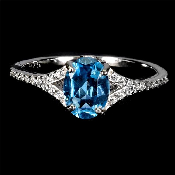 123.8X6 OVAL CUT SWISS BLUE TOPAZ RING IN 14K WHITE GOLD OVER 925 STERLING SILVER - SIZE 7