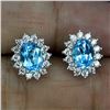 Image 2 : 7X5 MM SWISS BLUE TOPAZ AND CZ EARRINGS IN 14K WHITE GOLD OVER 925 STERLING SILVER