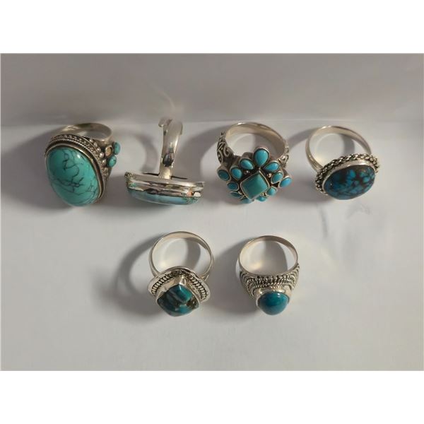 6 New Blue Turquoise Rings in Silver Settings - all stamped .925 (longest ring is 29 mm) Total weigh