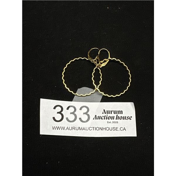 Pair of Gold Dangle Earrings