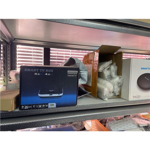 Lot of Smart TV Boxes, Power Inverter Unit, and Accessories