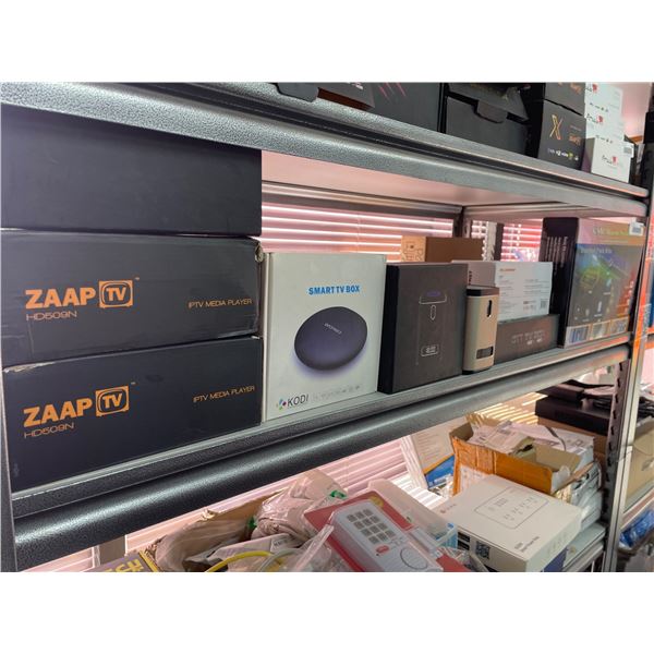 Lot of AssortedÂ Home Electronics Including Zaap TV, GSM Alarm System, and Smart TV Box