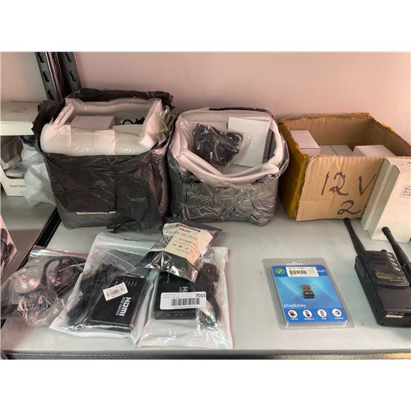 Lot of AssortedÂ Electronics, Including Two-Way Radios, Power Supplies, and Other Accessories