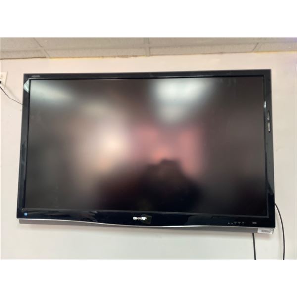 Sharp Television Model with Stand - Power, Sleep, and OPC Features