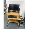 Image 1 : Complete Desktop Computer Setup with Desk, Monitor, Speakers, Keyboard, and Tower