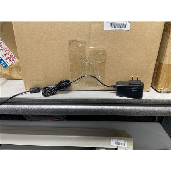 AC/DC Adapter Model YLJXOUB-1207 Input 100-240V Output 12V