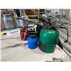 Image 1 : Four Metal Oil Cans in Various Colors and Sizes