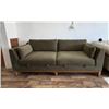 Image 1 : Green Upholstered Sofa With Built-In Storage Compartments