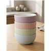 Image 1 : Four Ribbed Ceramic Bowls in Pastel Colors