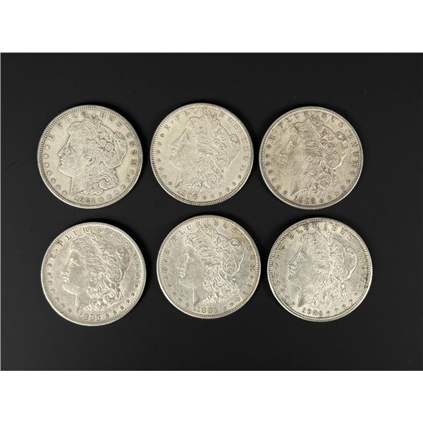 Group of 6 Morgan Silver Dollars