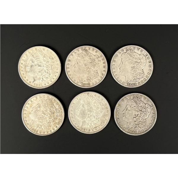 Group of 6 Morgan Silver Dollars