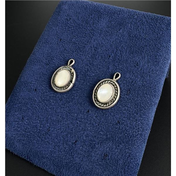 Pair of Navajo Sterling Mother of Pearl Pendants