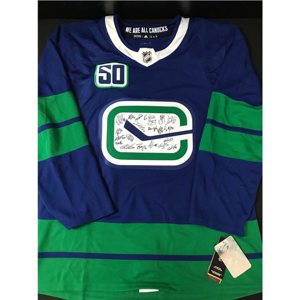 2019-21 CANUCKS TEAM SIGNED JERSEY INCLUDING PETTERSSON, BOESER ETC