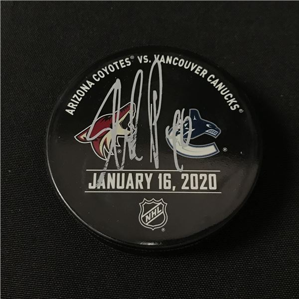 ELIAS PETTERSSON SIGNED PUCK WWOC COA