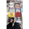 Image 5 : Collection of CDs Including Eagles, ABBA, Saturday Night Fever, Jimmy Buffett, Bob Marley and More