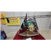 Image 4 : United Sailboat Ship's Wheel Electric Mantel Clock with Mirrored Chrome Sails Lights up 18" Tall