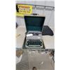 Image 1 : Eaton's Portable Manual Typewriter with Carrying Case