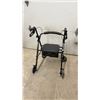 Image 10 : Medical Shower Chair with Armrests, Round Bath Stool, and Carex Rollator Walker