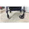 Image 8 : Medical Shower Chair with Armrests, Round Bath Stool, and Carex Rollator Walker