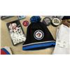 Image 2 : Winnipeg Jets Memorabilia Lot with Cole Perfetti Bobblehead, Jerseys, Pucks, and More