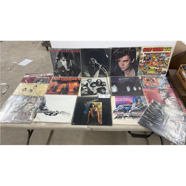 Collection of 16 Vinyl Lp Records Including Eric Clapton, Chuck Berry, and Simon and Garfunkel