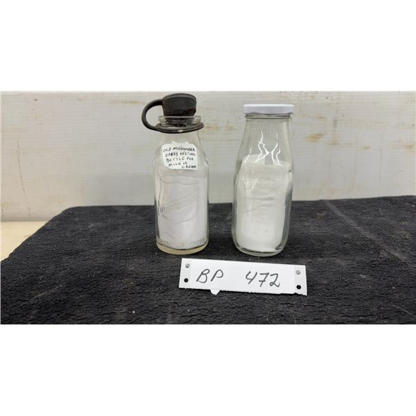Two Vintage Dairy Bottles: Mojonnier Testing Bottle and Cow Milk Bottle with Lid
