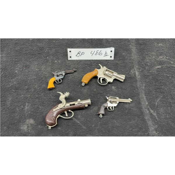 Miniature Toy Gun Collection Including Pirate Flintlock and Revolvers, 2" to 4"