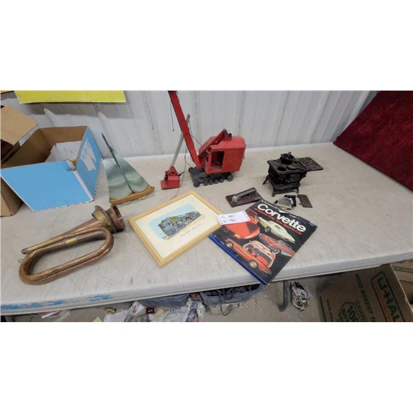 Tri Ang Toys Pressed Steel Crane, Corvette Book, Brass Bugle, Cast Iron Stove, and More