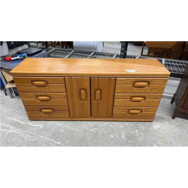 Oak 6 Drawer Dresser with Center Cabinet and Integrated Wood Pulls 70 x 18 x 30