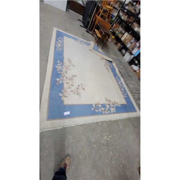 Floral Area Rug with Blue Border and Cream Center 144 x 104"