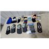 Image 1 : Assorted Winter Accessories Including Gloves, Socks, Toques, and Ice Cleats All New