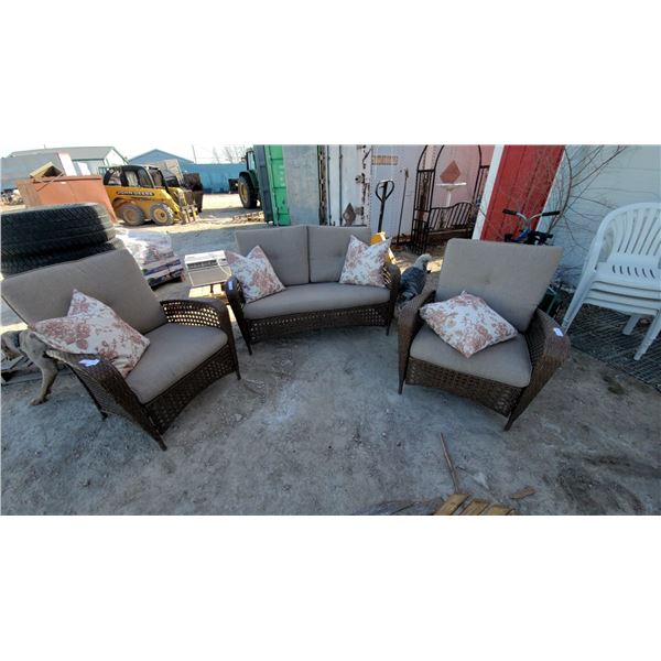 Wicker Patio Furniture Set with Gray Cushions and Floral Throw Pillows, Three Pieces