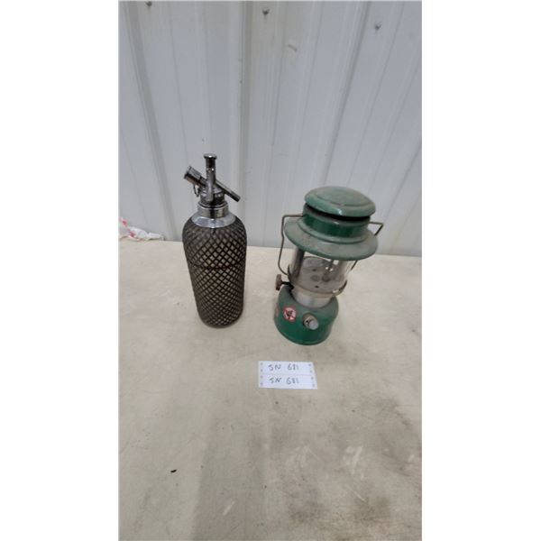 Coleman Model 335 Green Gas Lantern and Vintage Mesh-Wrapped Soda Stezler Bottle