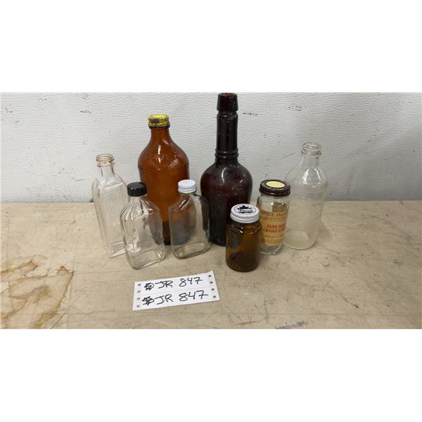 Collection of Vintage Glass Bottles Including Javex, Pepsi-Cola, Spice Islands, and More