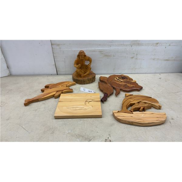 Collection of Handcrafted Wood Carvings Including Dolphins, Rose, Loon, and More