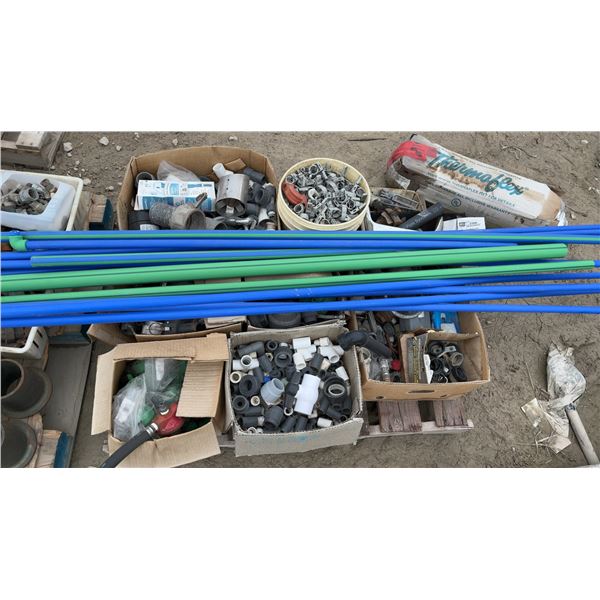 Pallet Lot of Assorted PVC and CPVC Pipe Fittings, Blue and Green Tubing, Pipe Clamps, and More