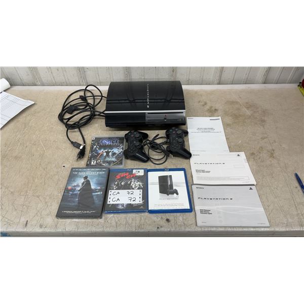 Sony PlayStation 3 Console with Two Controllers, Game, Blu-Ray Movies, and More