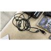 Image 6 : Sony PlayStation 3 Console with Two Controllers, Game, Blu-Ray Movies, and More