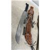 Image 2 : 2 Machetes with Decorated Leather Sheath and Wooden Scabbard