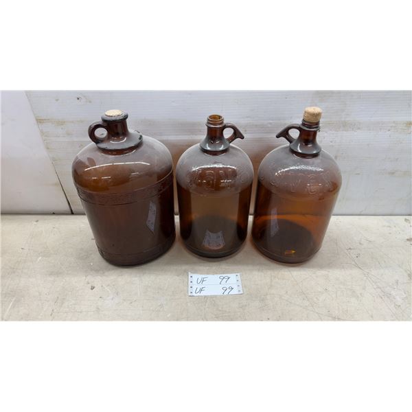 Three Vintage Javex Brown Glass Jugs with Cork Stoppers and Finger Loop Handles