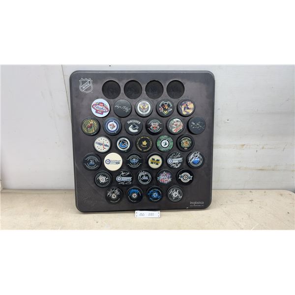 Large Lot of Winnipeg Jets Autographed Pucks in Inglasco Brand Display, Conner, Sheiffle, Perfetti